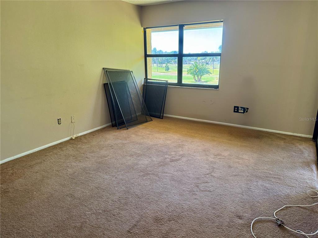 12300 Vonn Road, Unit 5304 Largo, FL 33774 - Photo 9 of 21 an empty room with a window