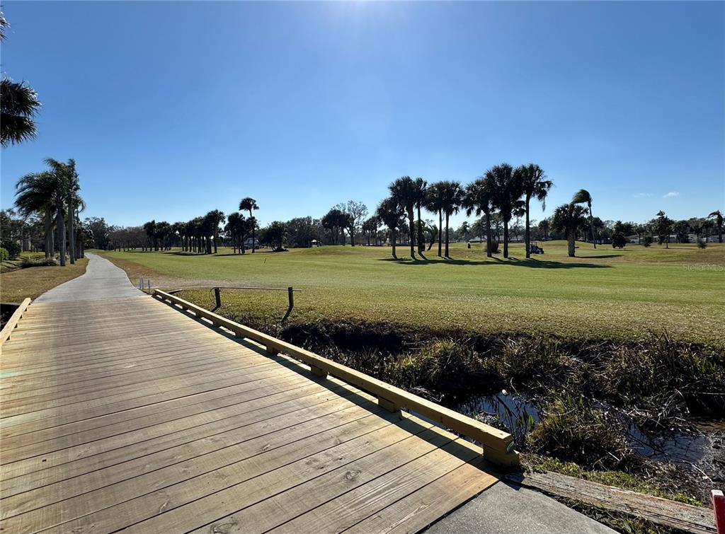 12300 Vonn Road, Unit 5304 Largo, FL 33774 - Photo 10 of 21 a view of a golf course with a park