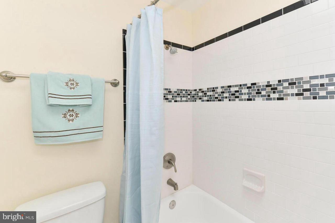 1648 L Street Northeast Washington, DC 20002 - Photo 19 of 27 a bathroom with a bathtub and shower
