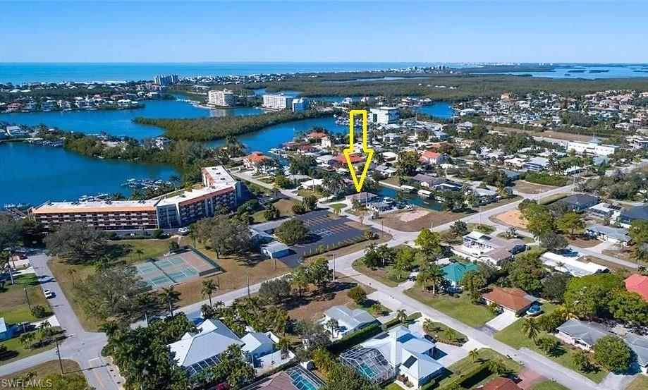 217 3rd Street Bonita Springs, FL 34134 - Photo 13 of 14 an aerial view of multiple house