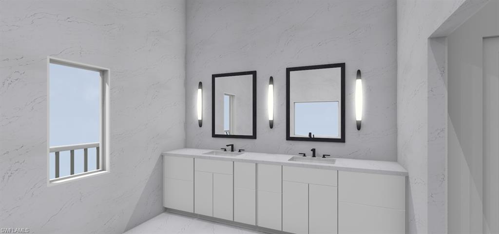 217 3rd Street Bonita Springs, FL 34134 - Photo 9 of 14 a bathroom with a double vanity sink and a mirror