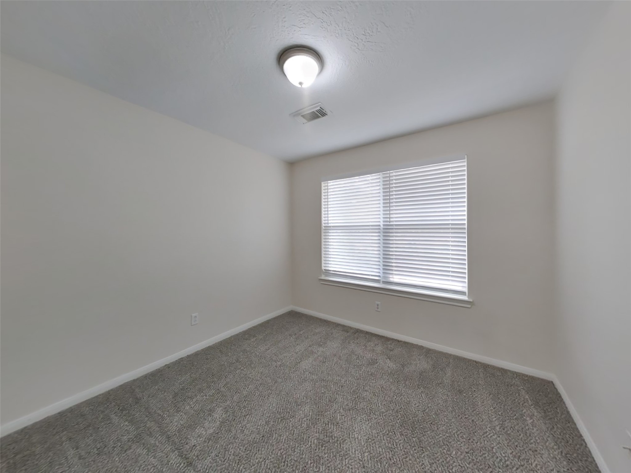 2906 Crescent Bend Road Spring, TX 77388 - Photo 12 of 18 an empty room with a window