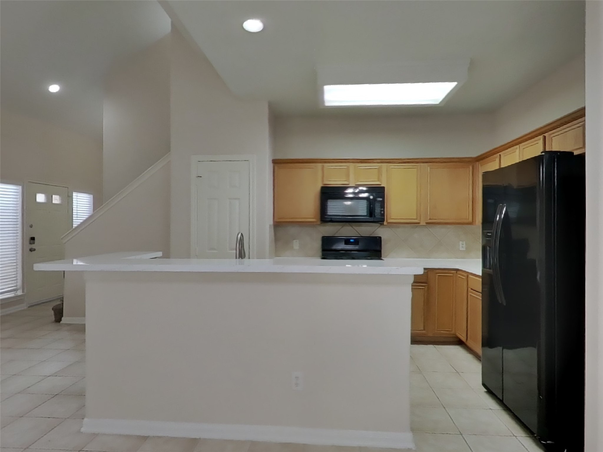 2906 Crescent Bend Road Spring, TX 77388 - Photo 5 of 18 a kitchen with stainless steel appliances a refrigerator and a stove