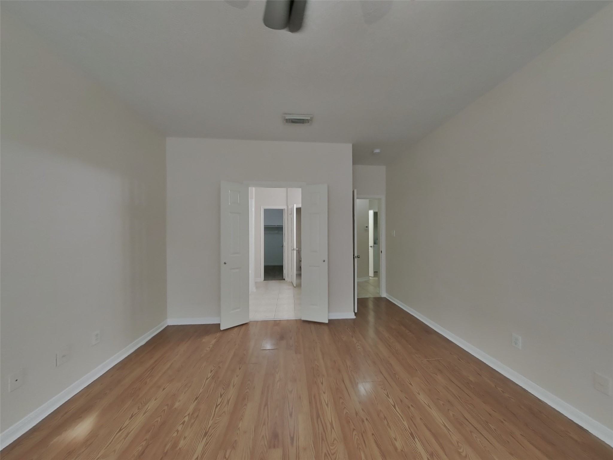 2906 Crescent Bend Road Spring, TX 77388 - Photo 7 of 18 a view of an empty room with wooden floor