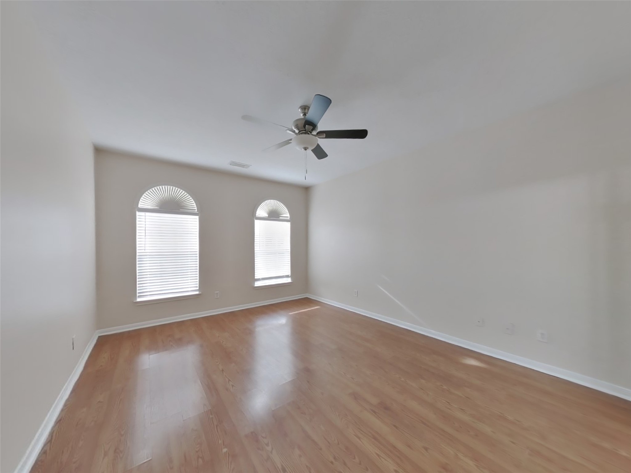 2906 Crescent Bend Road Spring, TX 77388 - Photo 8 of 18 wooden floor in an empty room with a window