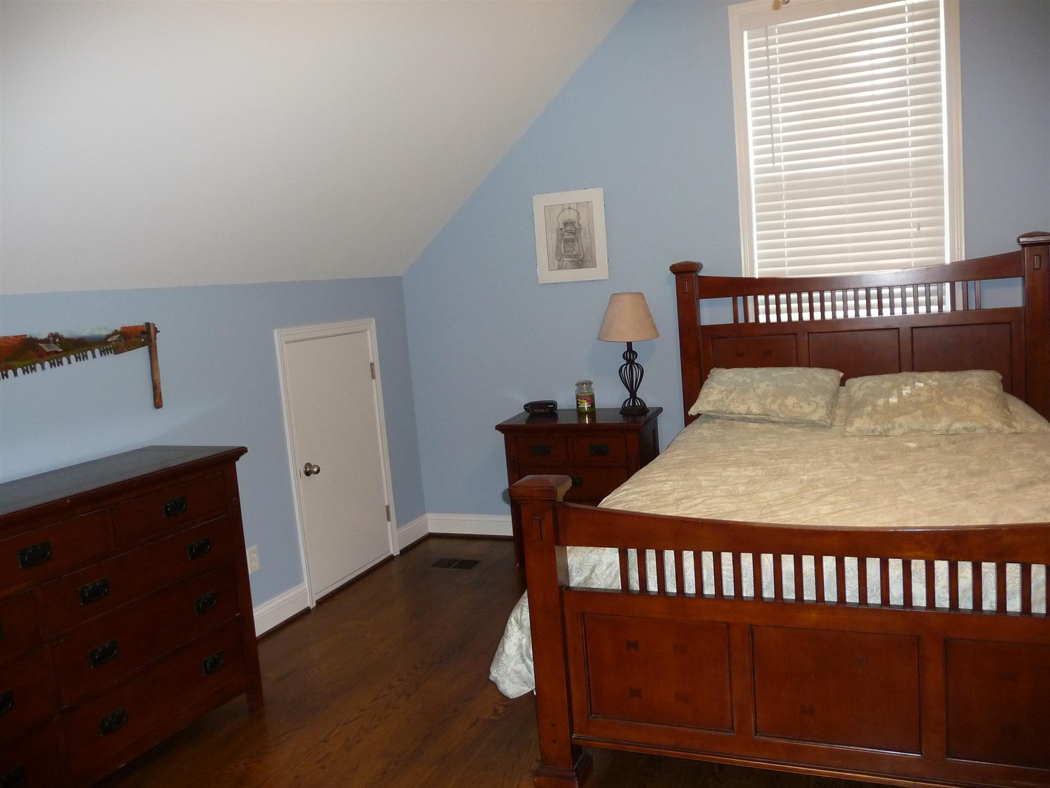 198 Wilkinson Road Cottontown, TN 37048 - Photo 17 of 23 a bedroom with a bed and a window