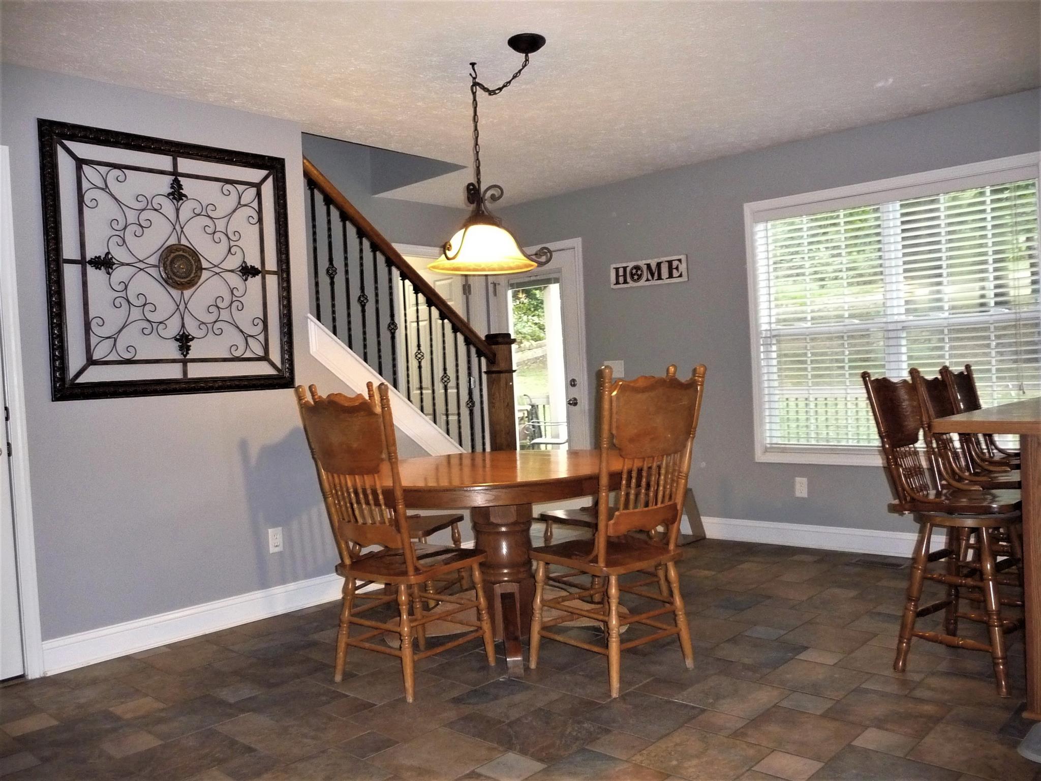 198 Wilkinson Road Cottontown, TN 37048 - Photo 5 of 23 a dining room with furniture and window