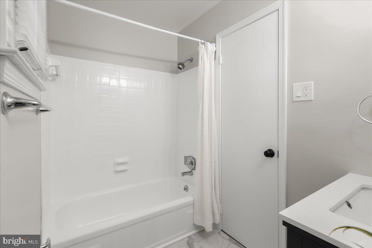 2053 Kings House Road Silver Spring, MD 20905 - Photo 26 of 33 Upstairs Hall Bath with Shower/Tub Combo