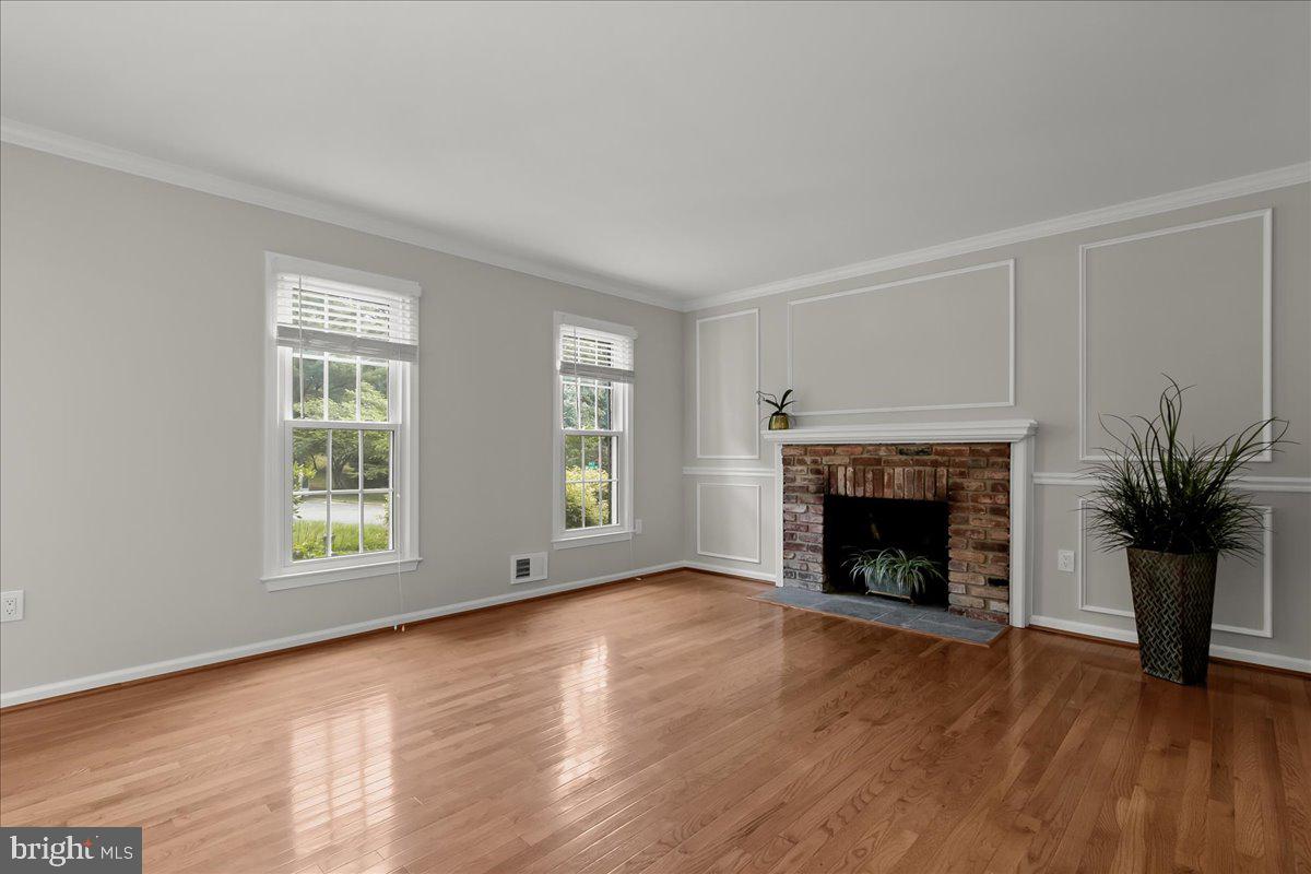2053 Kings House Road Silver Spring, MD 20905 - Photo 5 of 33 Living Room with Wood-Burning Fireplace