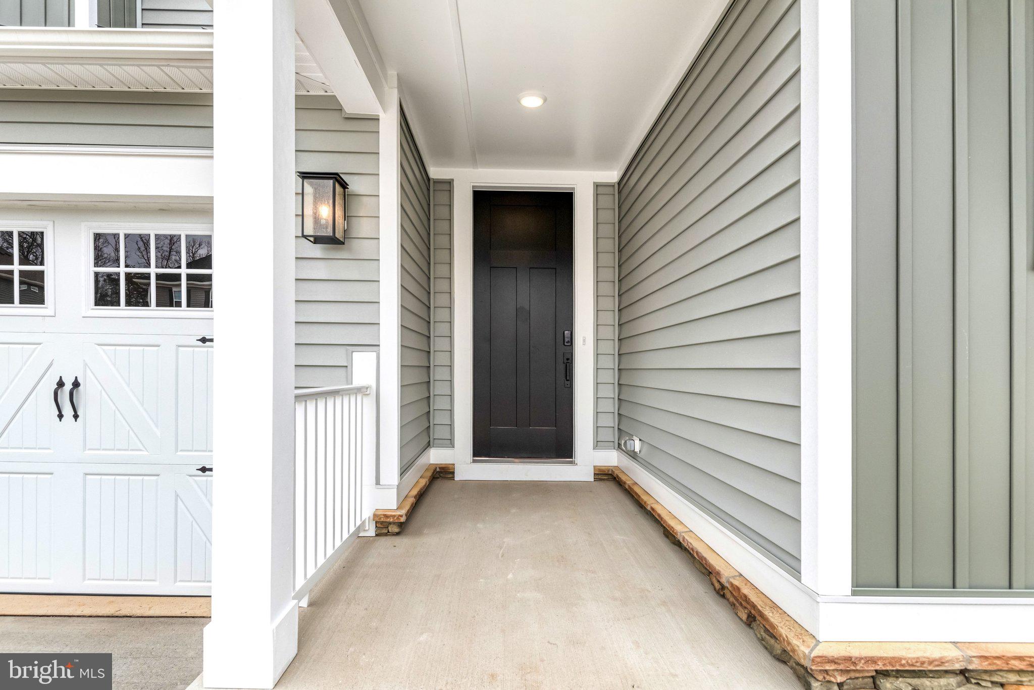 2071 Springvale Drive Bealeton, VA 22712 - Photo 2 of 64 a view of a house with a door and porch
