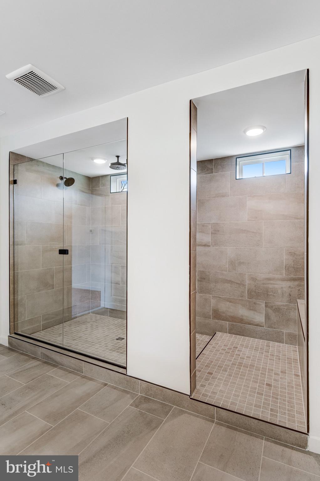 2071 Springvale Drive Bealeton, VA 22712 - Photo 39 of 64 a bathroom with a glass shower door