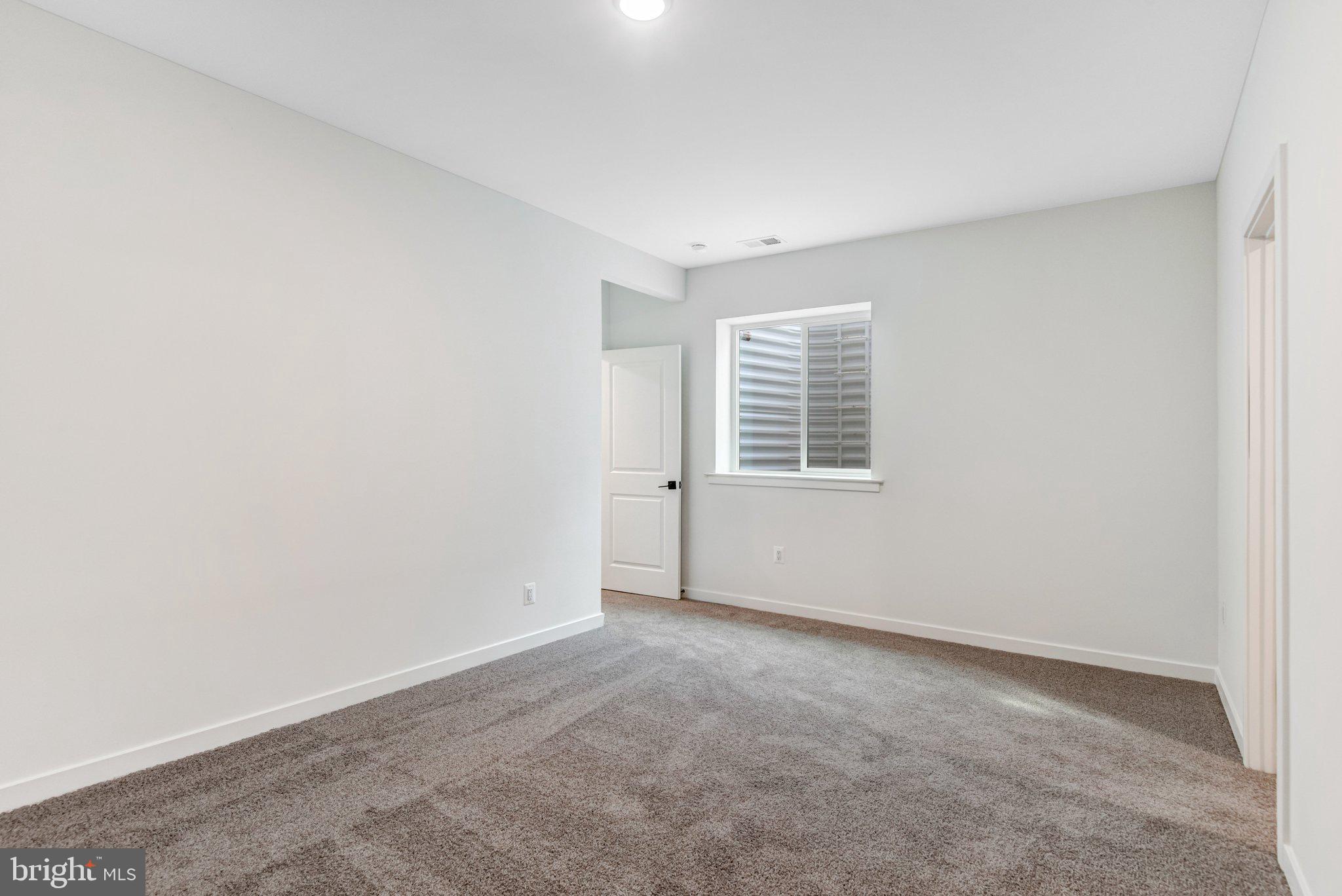 2071 Springvale Drive Bealeton, VA 22712 - Photo 45 of 64 an empty room with windows