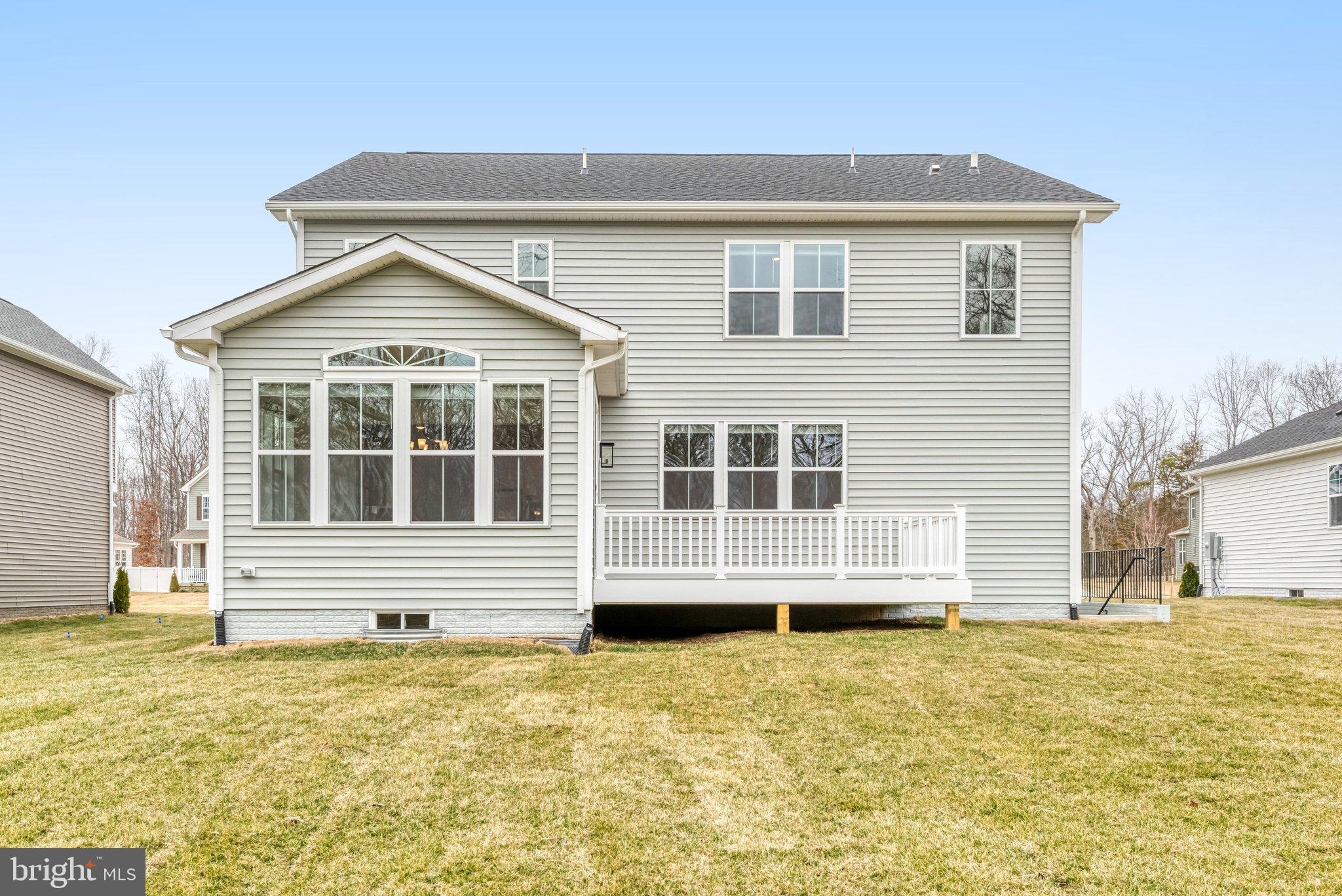 2071 Springvale Drive Bealeton, VA 22712 - Photo 55 of 64 a front view of a house with a swimming pool
