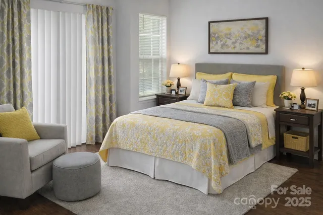 a bedroom with bed and a couch