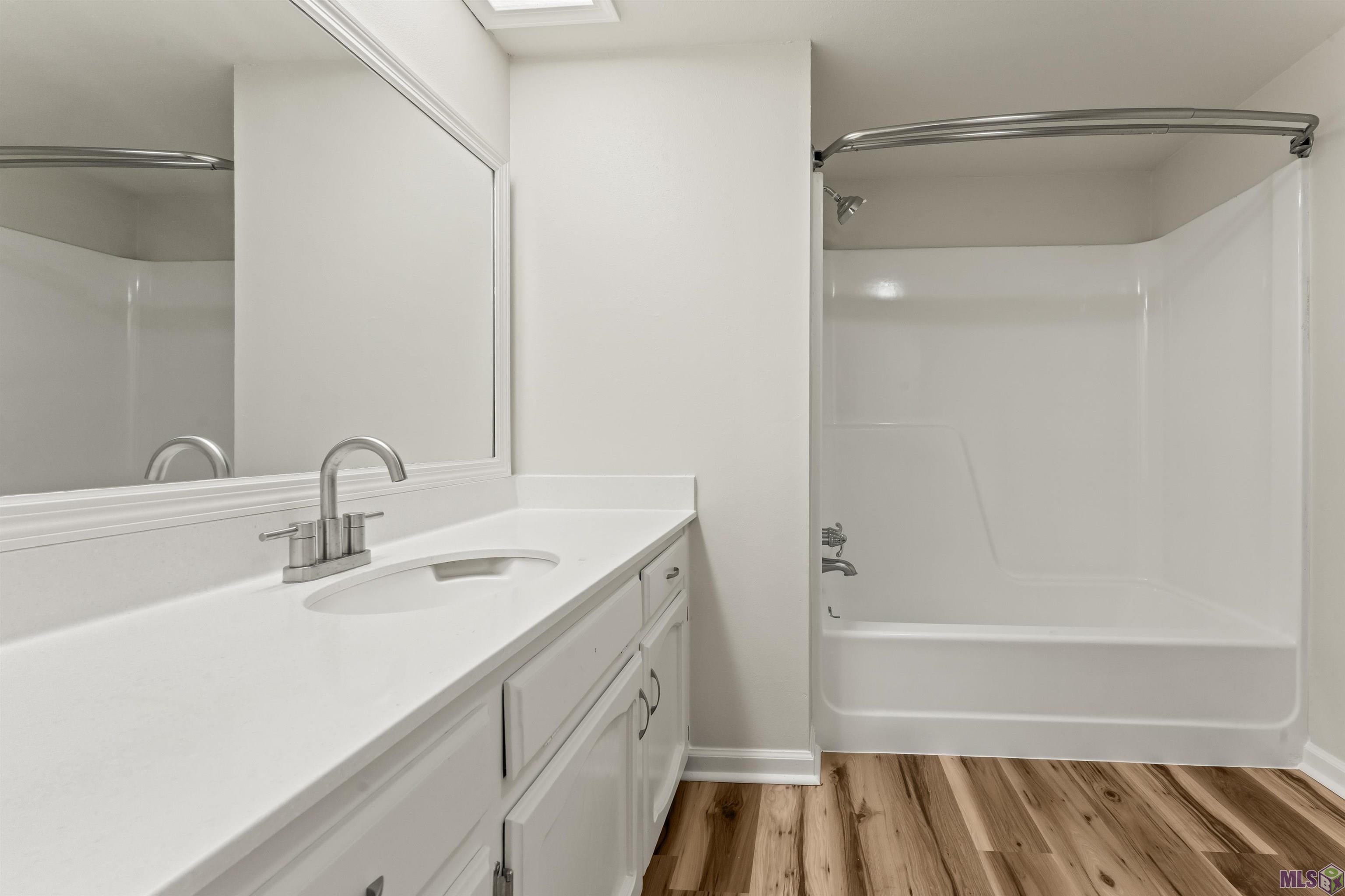 5203 Sleepy Hollow Drive, Unit 5203 Baton Rouge, LA 70817 - Photo 14 of 21 Full bathroom across for bedroom downstairs