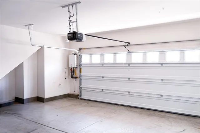 a view of walk in closet and window