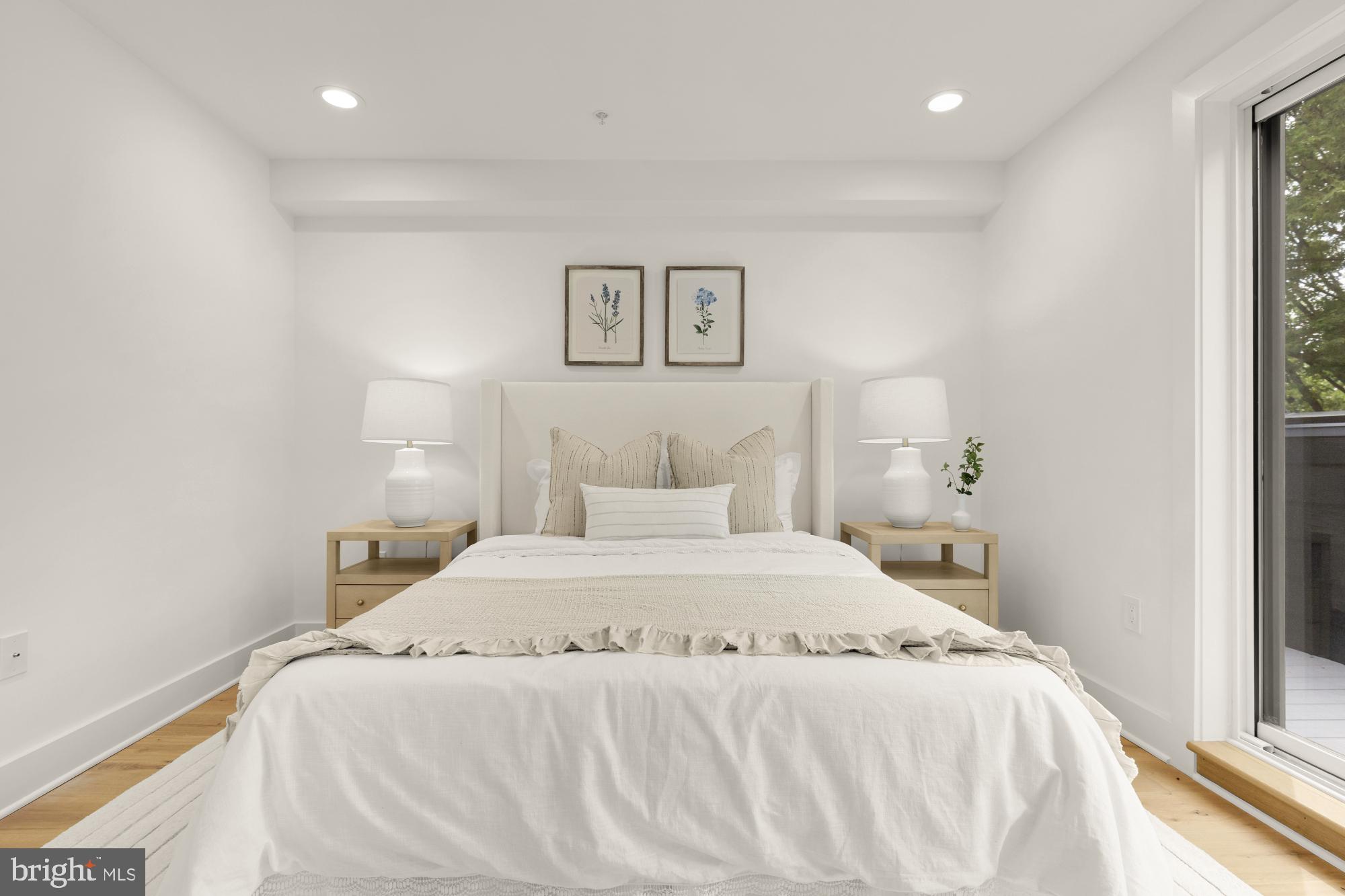 1325 Orren Street Northeast, Unit D Washington, DC 20002 - Photo 21 of 44 a bedroom with a bed and a window