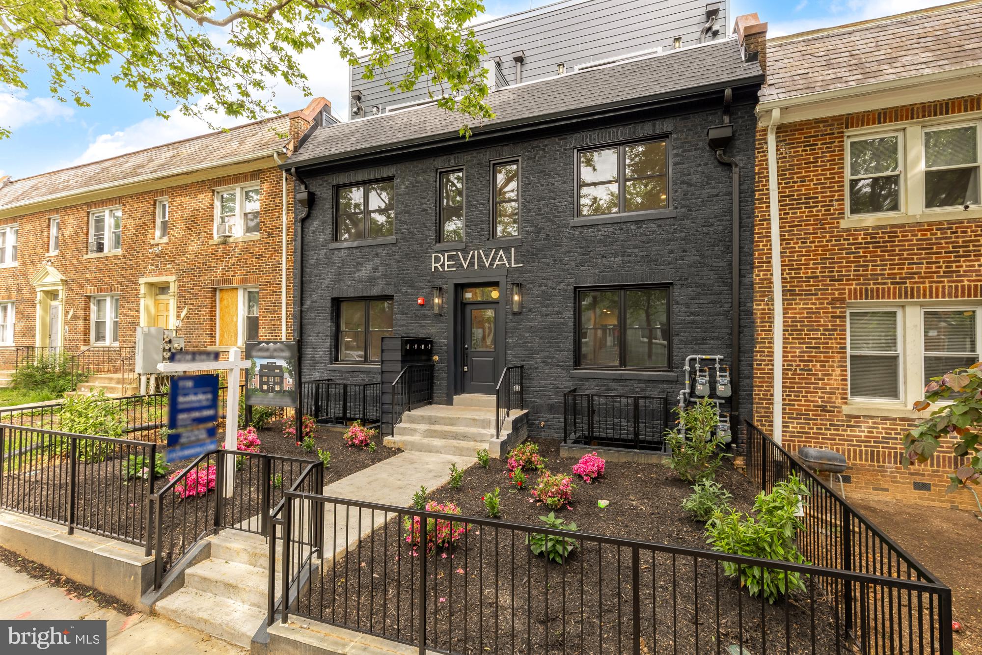 1325 Orren Street Northeast, Unit D Washington, DC 20002 - Photo 42 of 44 a view of a house with sitting area