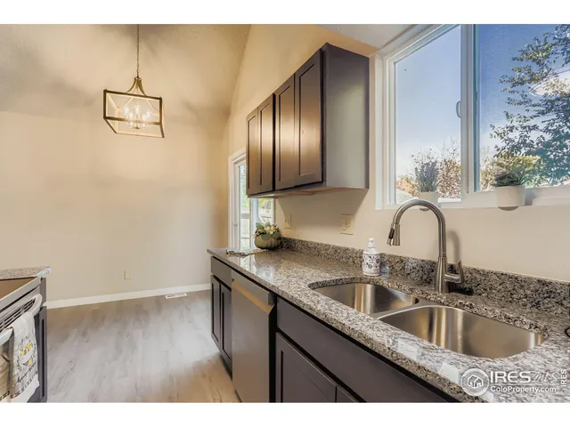a kitchen with a stove and a microwave