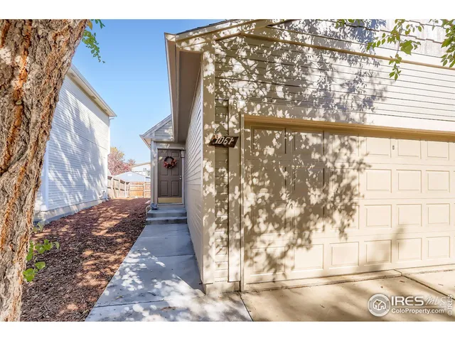 a view of a black and white house