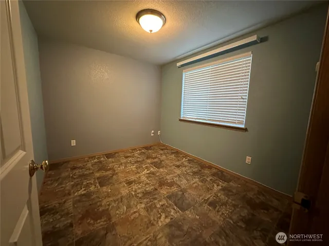 a view of a room with a window