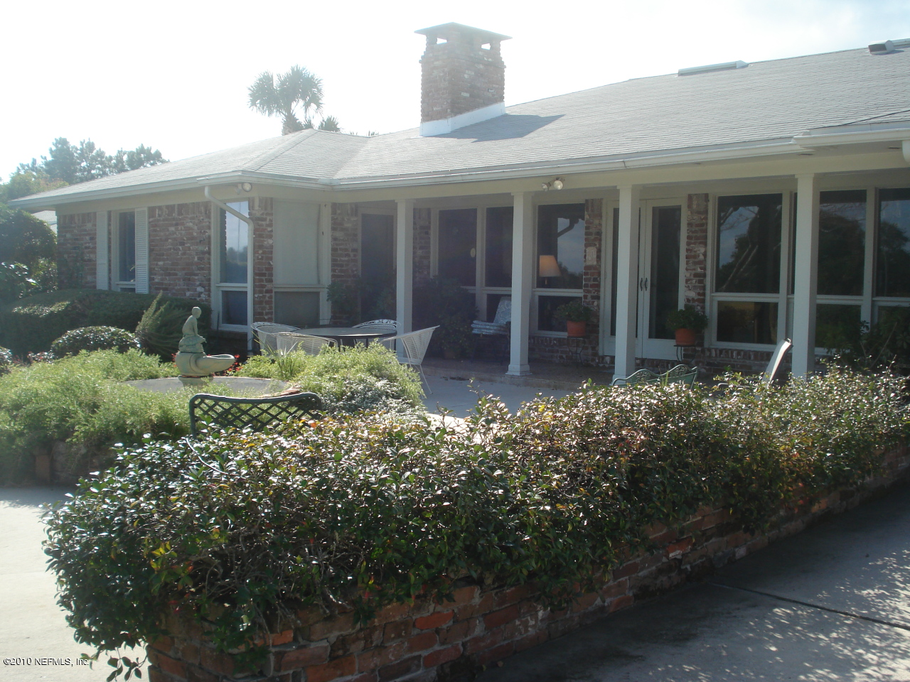 239 Pablo Road Ponte Vedra Beach, FL 32082 - Photo 4 of 13 front view of a house with a yard