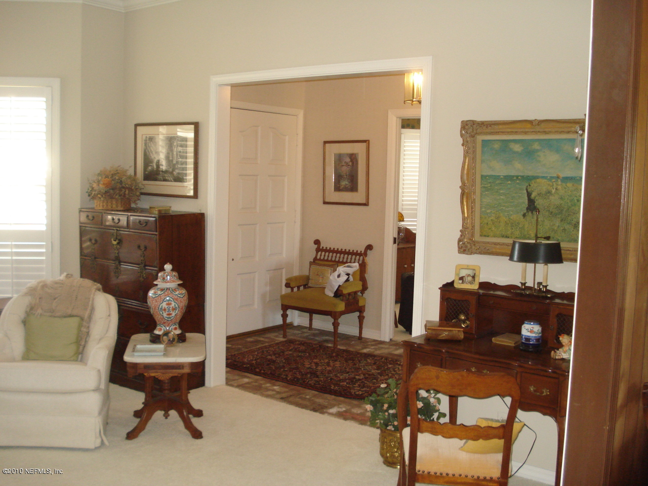 239 Pablo Road Ponte Vedra Beach, FL 32082 - Photo 9 of 13 a living room with furniture and a window