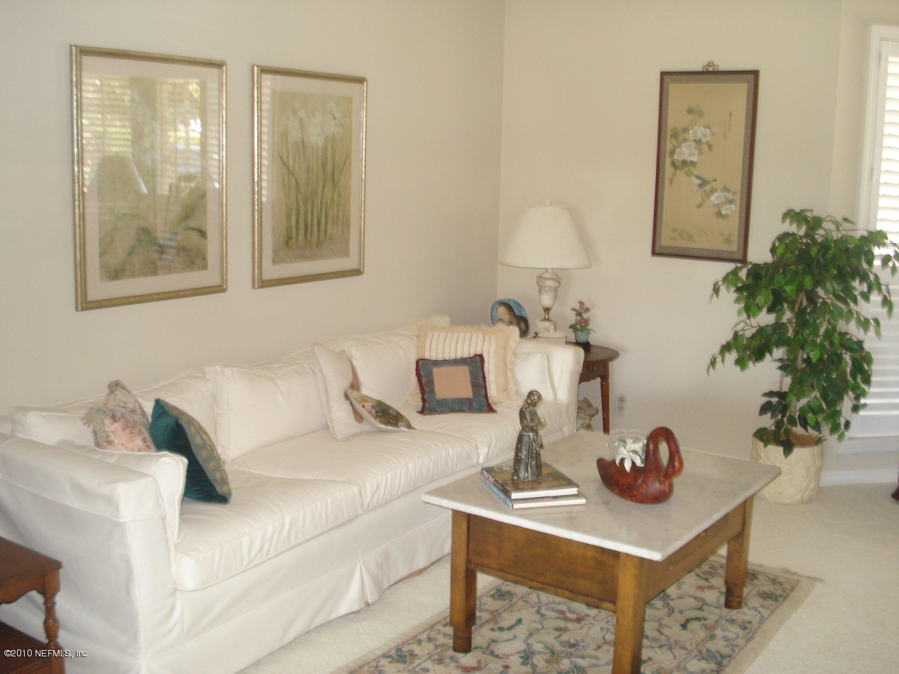239 Pablo Road Ponte Vedra Beach, FL 32082 - Photo 10 of 13 a living room with furniture and a potted plant
