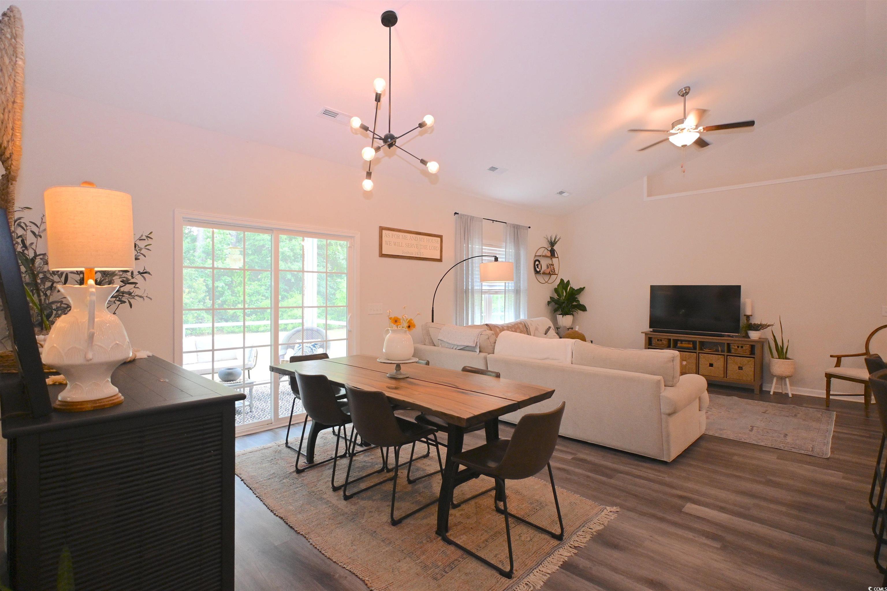 523 Charlton Boulevard Georgetown, SC 29440 - Photo 9 of 33 Dining area with lofted ceiling