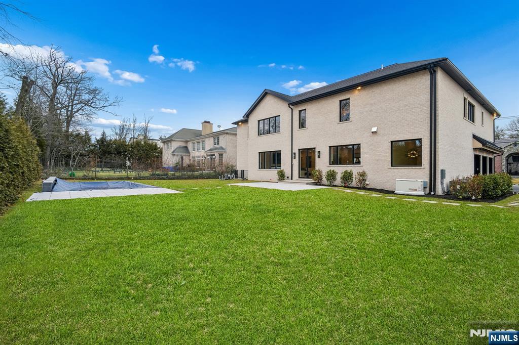 50 Roberts Road Englewood Cliffs, NJ 07632 - Photo 2 of 50 a view of a house with a yard