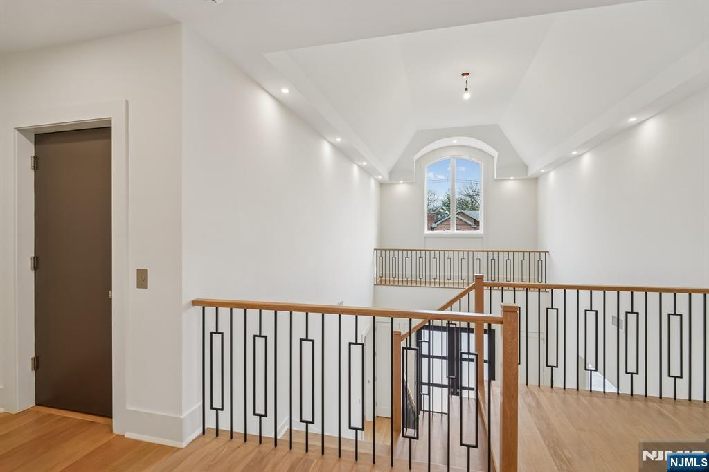 50 Roberts Road Englewood Cliffs, NJ 07632 - Photo 22 of 50 a view of a hallway with windows and stairs