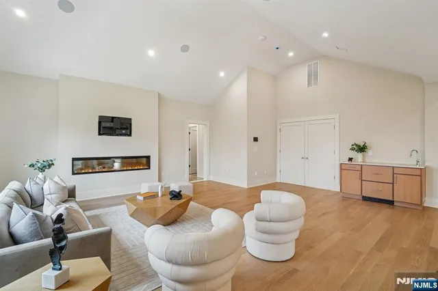 a living room with furniture and a table