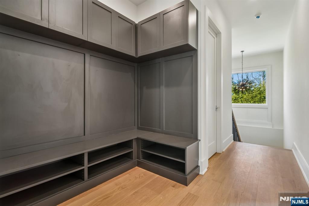 50 Roberts Road Englewood Cliffs, NJ 07632 - Photo 42 of 50 a view of walk in closet with empty racks