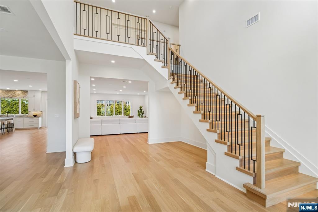 50 Roberts Road Englewood Cliffs, NJ 07632 - Photo 6 of 50 a view of entryway and hall with wooden floor