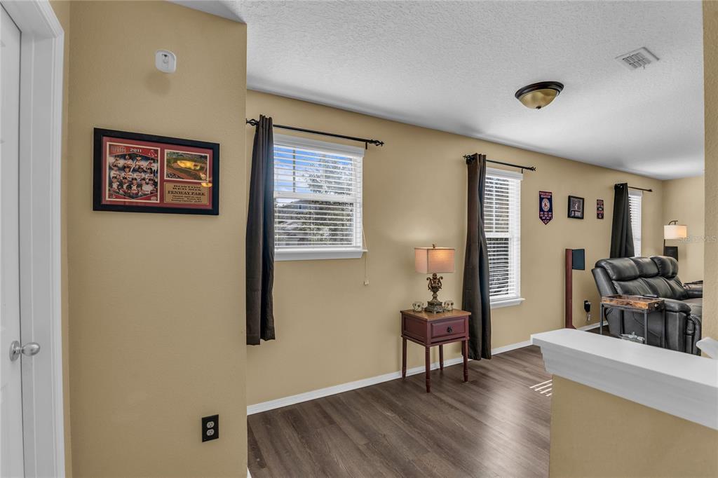 2962 Inca Avenue Clermont, FL 34715 - Photo 22 of 55 a view of a livingroom with furniture and a window