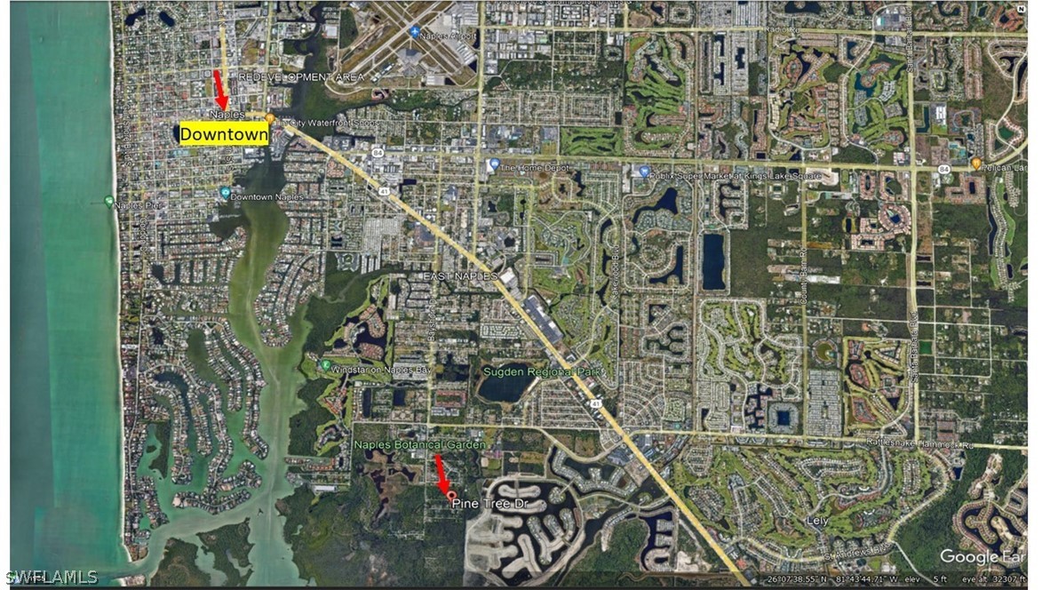 Pine Tree Drive Naples, FL 34112 - Photo 5 of 7 a view of entryway with outdoor area