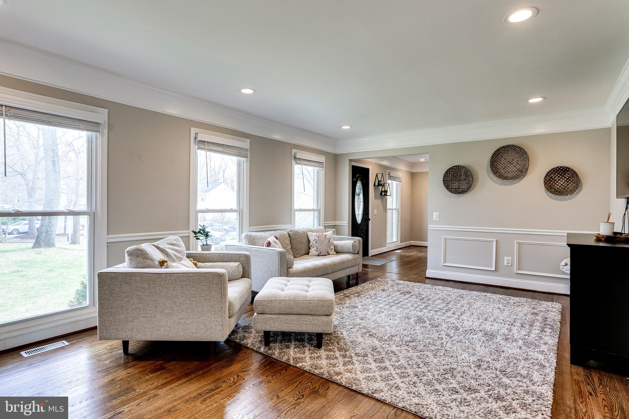Living room is spacious & light filled