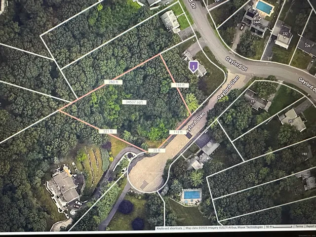 a aerial view of a house with a swimming pool