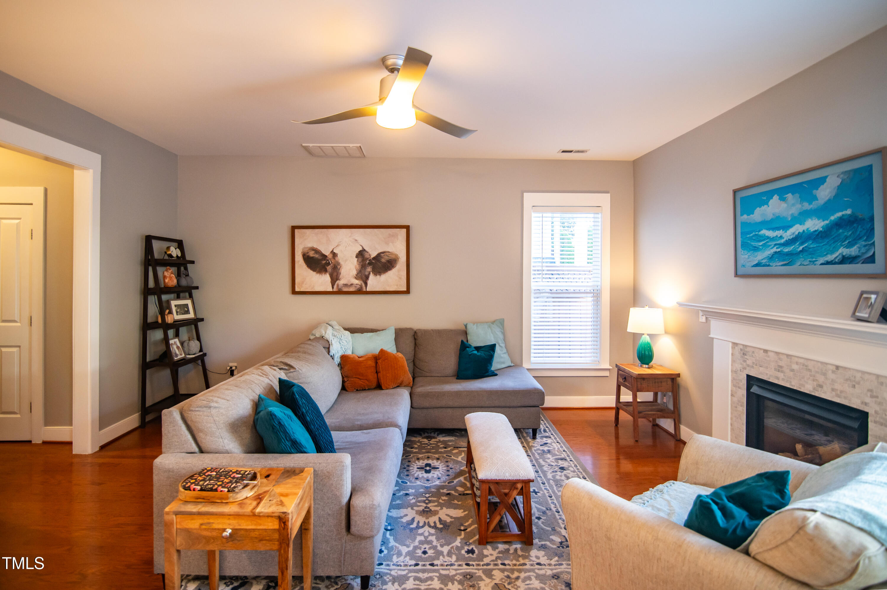 2220 Dunlin Lane Raleigh, NC 27614 - Photo 14 of 38 a living room with furniture and a fireplace