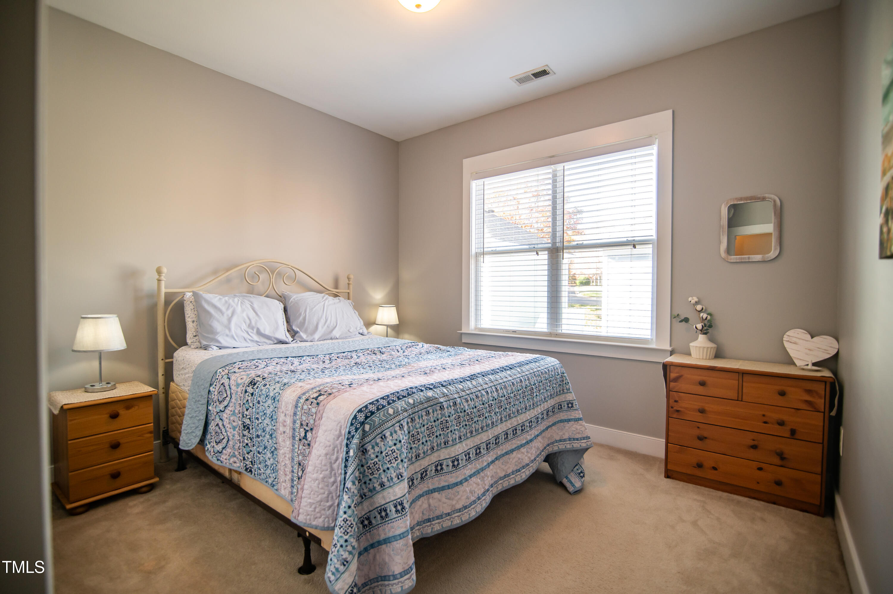 2220 Dunlin Lane Raleigh, NC 27614 - Photo 17 of 38 a bedroom with a bed and a dresser