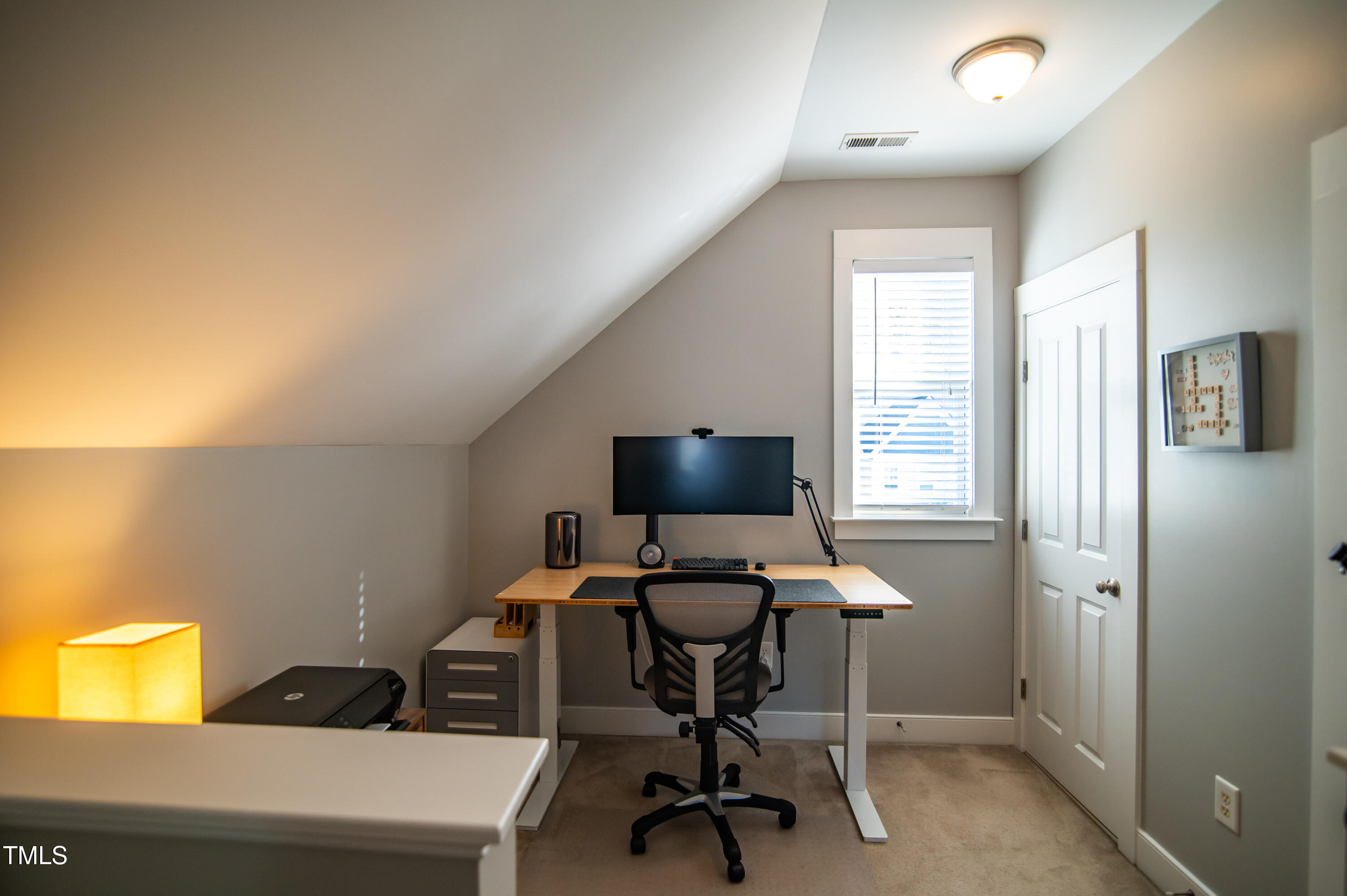 2220 Dunlin Lane Raleigh, NC 27614 - Photo 28 of 38 a view of a workspace with furniture and a window