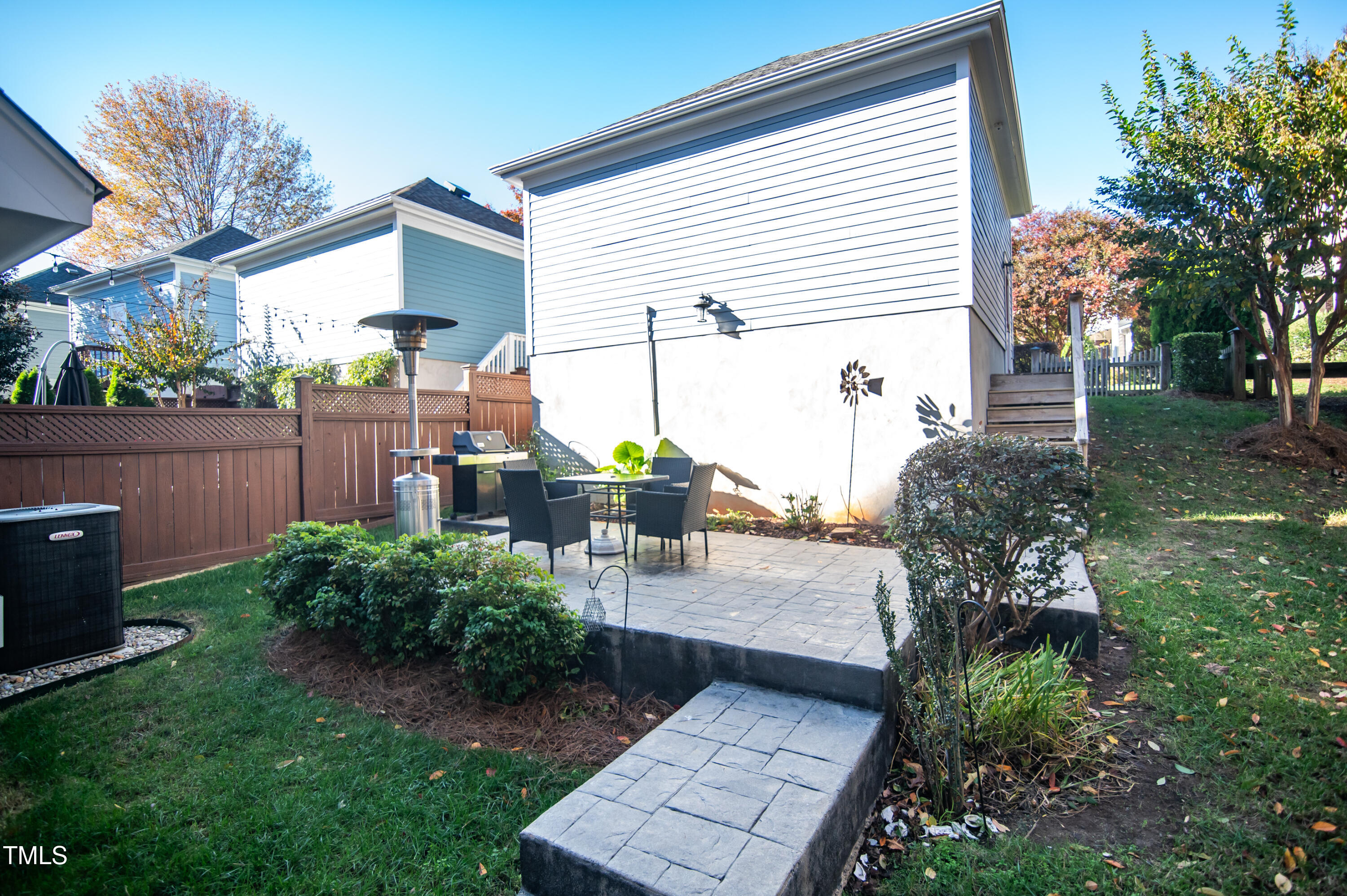 2220 Dunlin Lane Raleigh, NC 27614 - Photo 29 of 38 a view of a backyard with plants and a patio