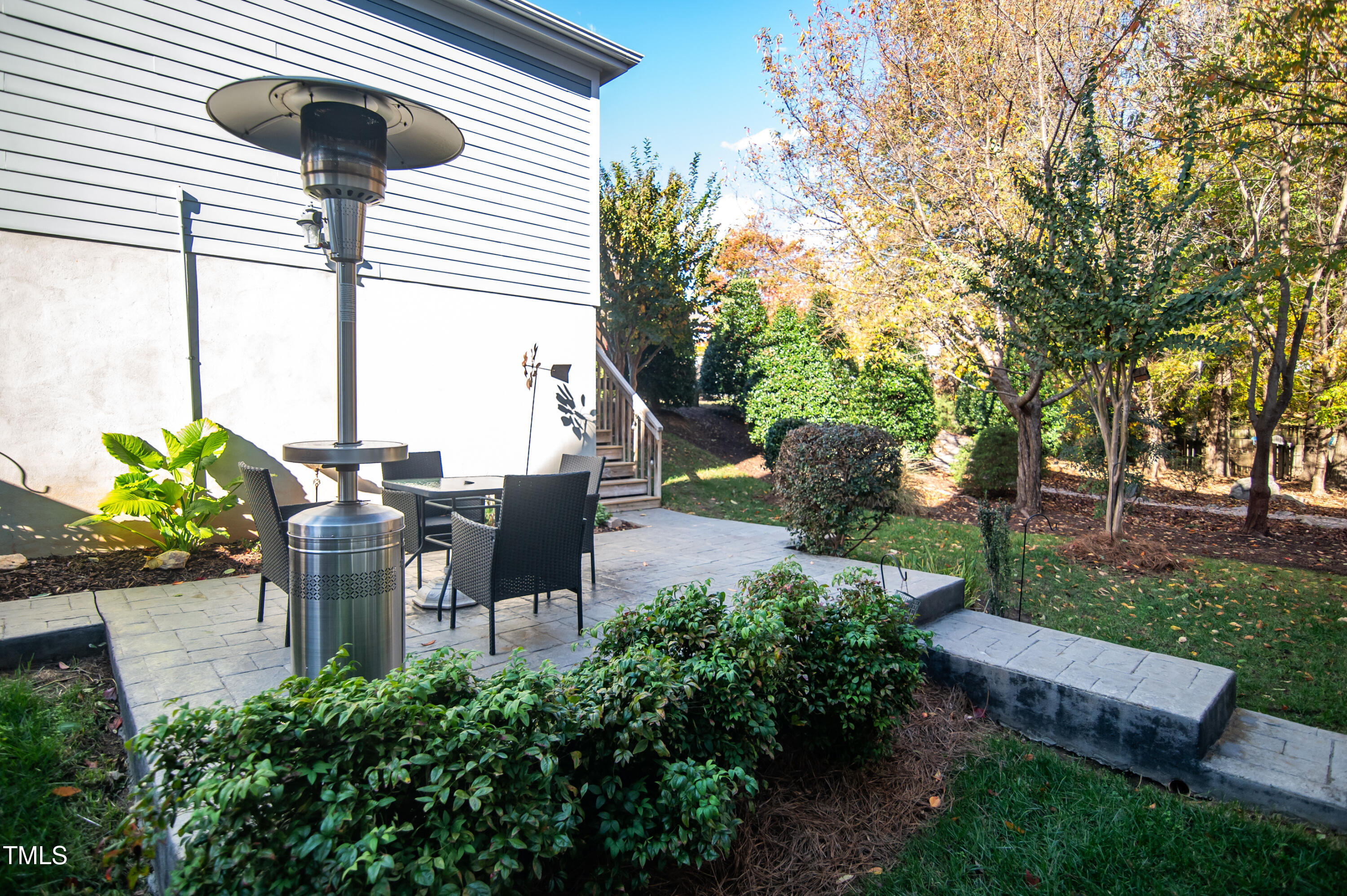 2220 Dunlin Lane Raleigh, NC 27614 - Photo 30 of 38 a table and chairs in the garden