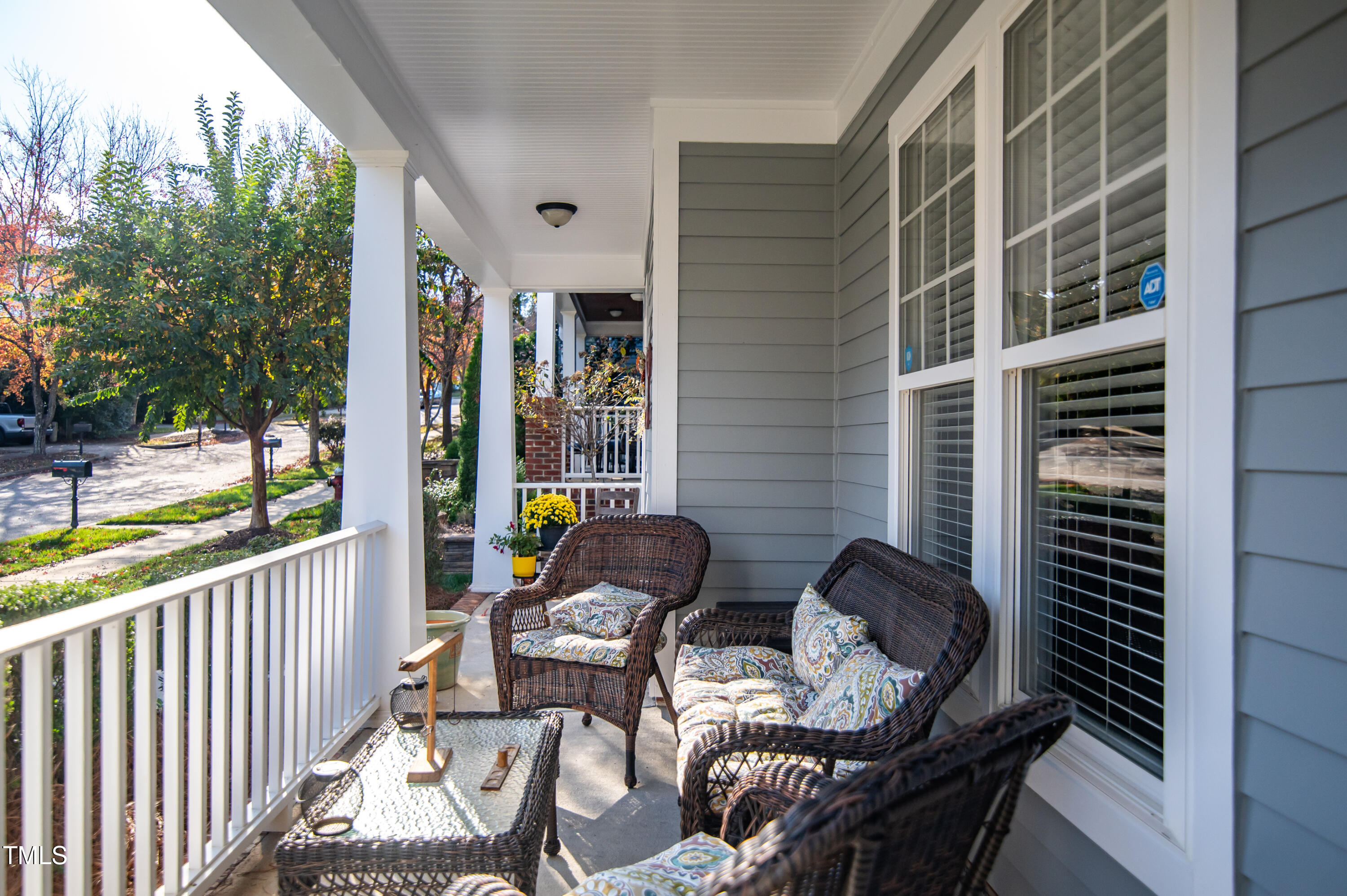 2220 Dunlin Lane Raleigh, NC 27614 - Photo 3 of 38 a balcony with chairs and a potted plant