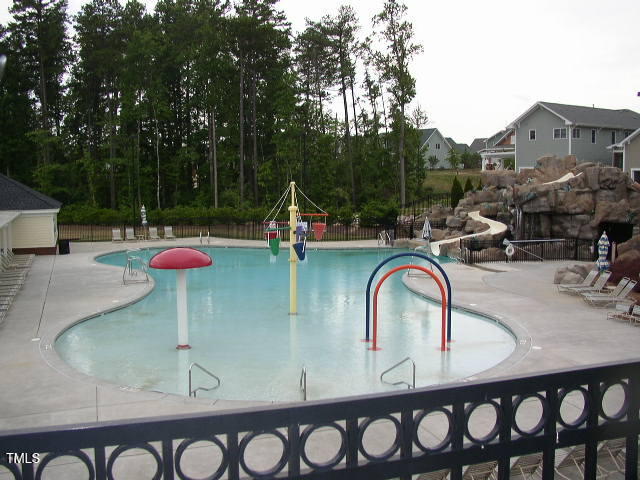 2220 Dunlin Lane Raleigh, NC 27614 - Photo 38 of 38 a view of a swimming pool with a patio