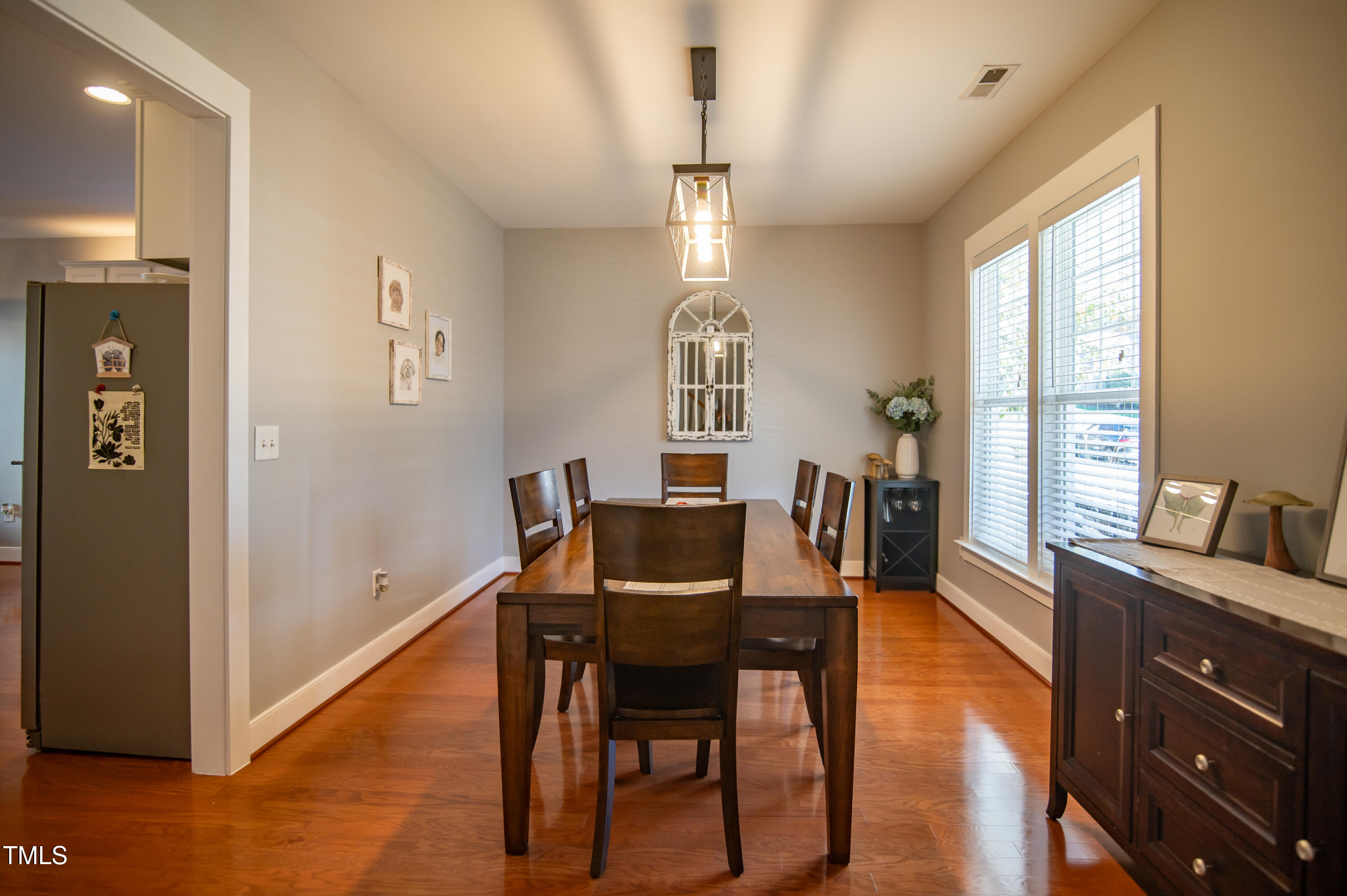 2220 Dunlin Lane Raleigh, NC 27614 - Photo 6 of 38 a view of a dining room with furniture window and wooden floor