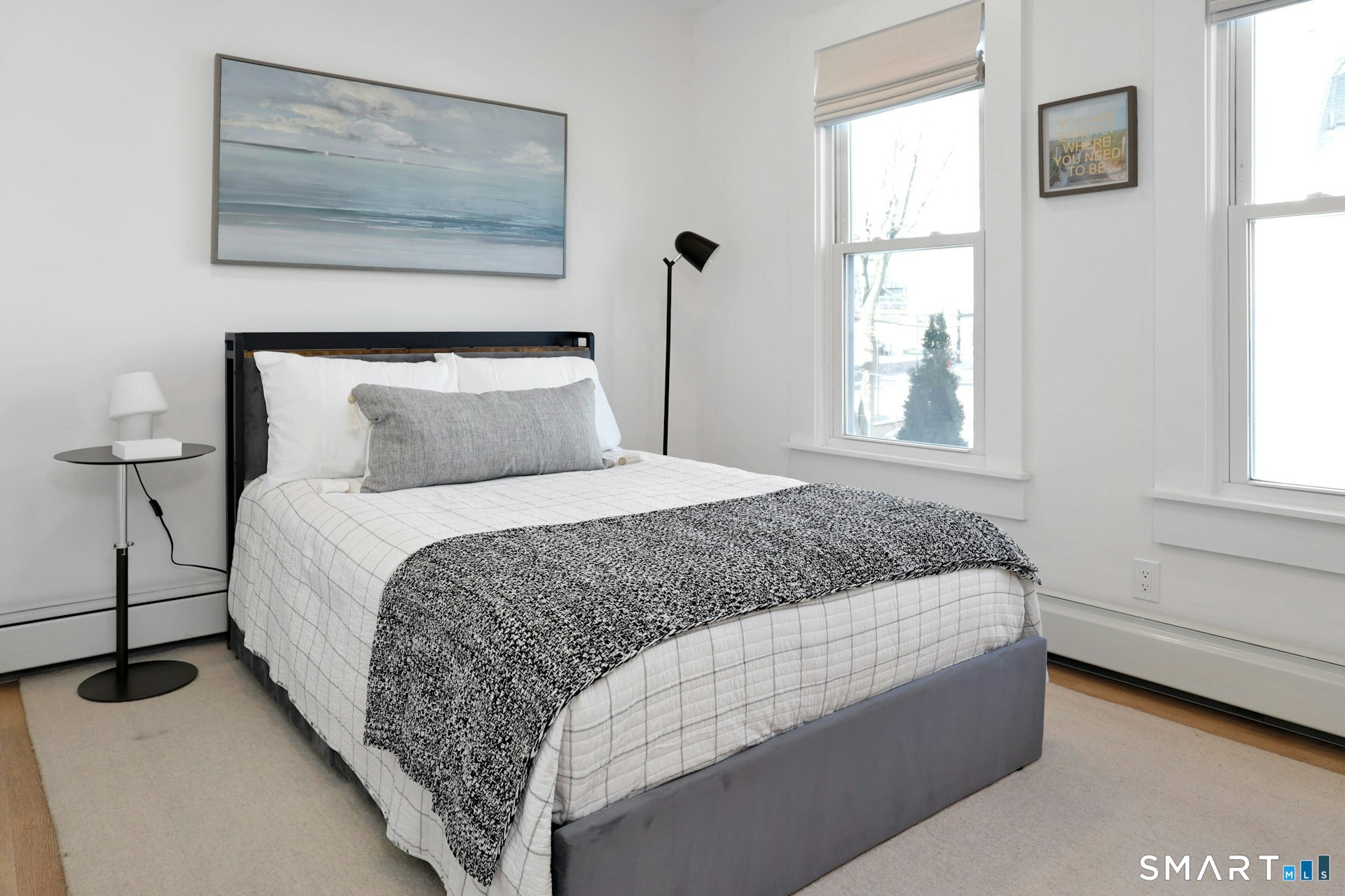 225 Washington Boulevard Stamford, CT 06902 - Photo 21 of 35 a bedroom with a bed and window