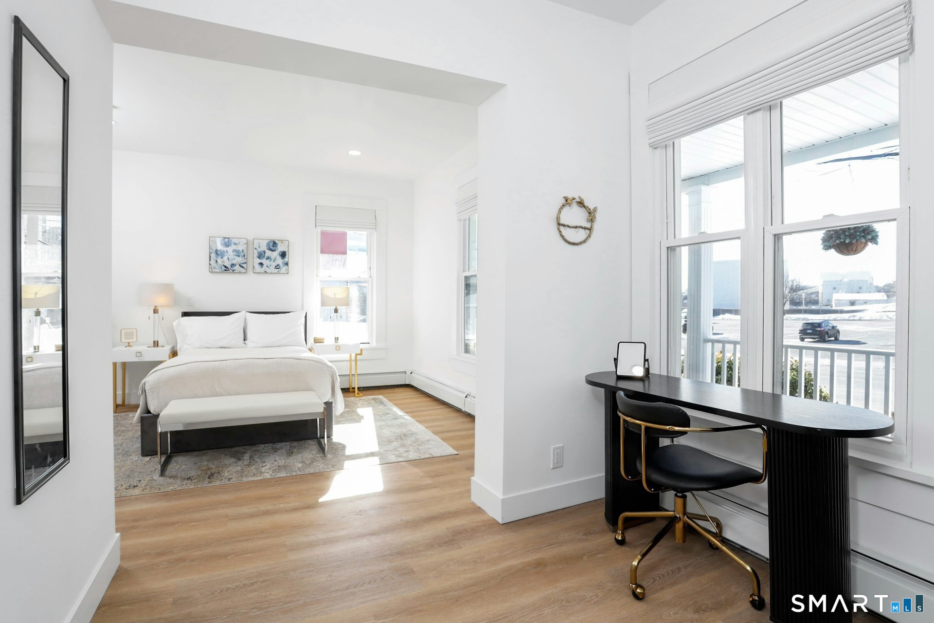 225 Washington Boulevard Stamford, CT 06902 - Photo 6 of 35 a view of a workspace with furniture and a window