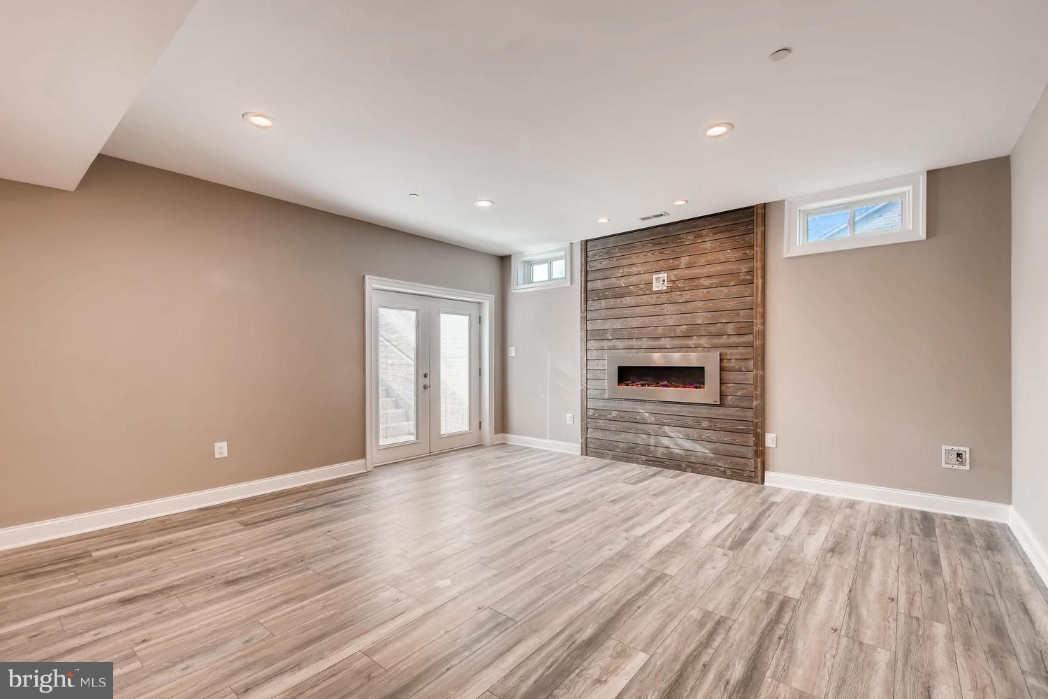 4609 Ridge Road Baltimore, MD 21236 - Photo 28 of 36 Lower Level Fireplace