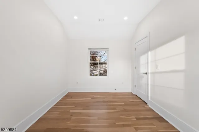 a kitchen with stainless steel appliances a stove a microwave a sink a stove and cabinets